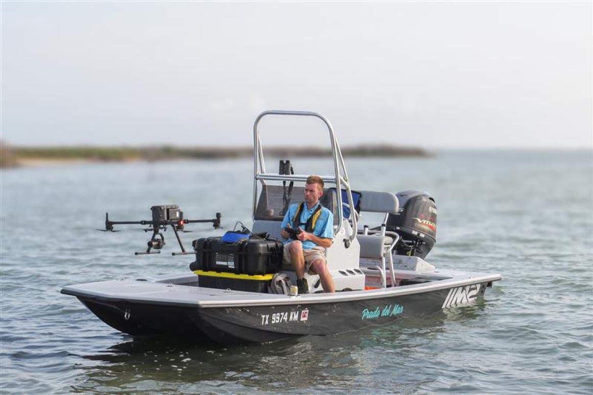 Research working with drone to assess bird mortality event in Coastal Bend